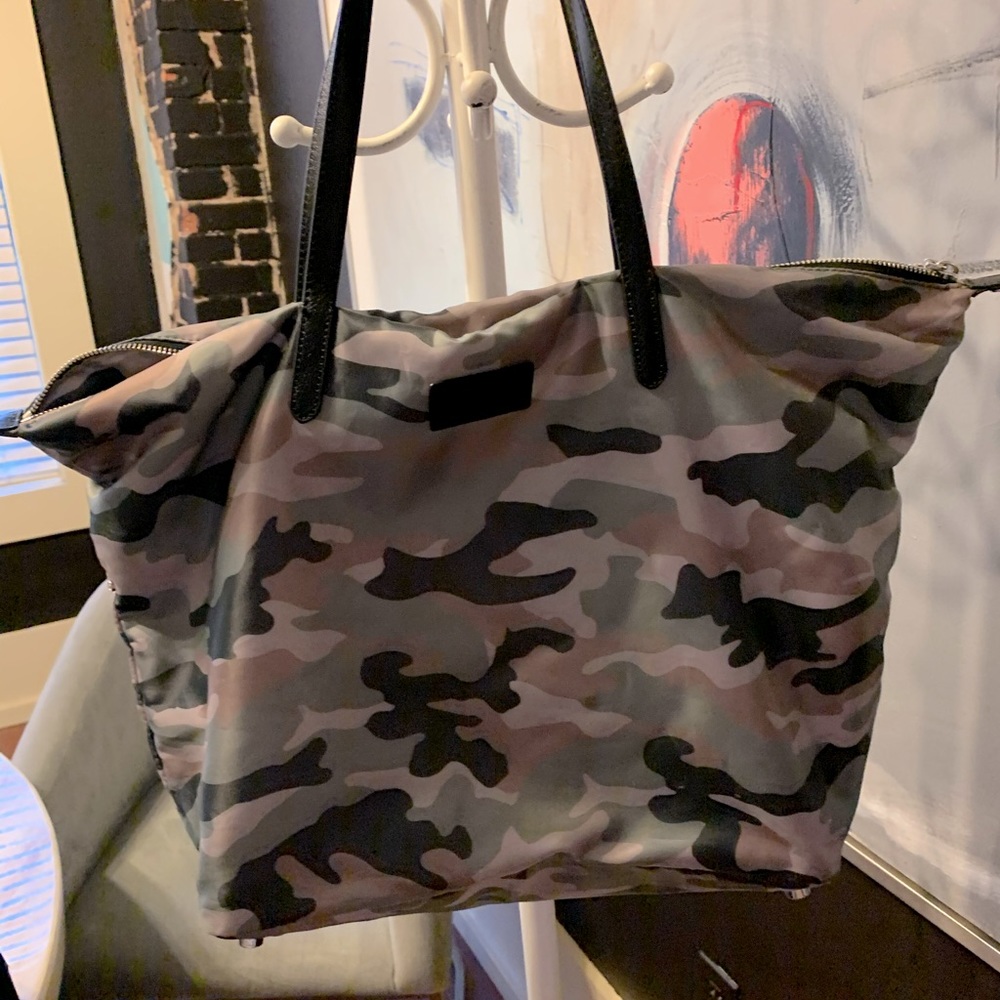 Designer Rebecca Minkoff camo tote with lots in side pockets carried once.